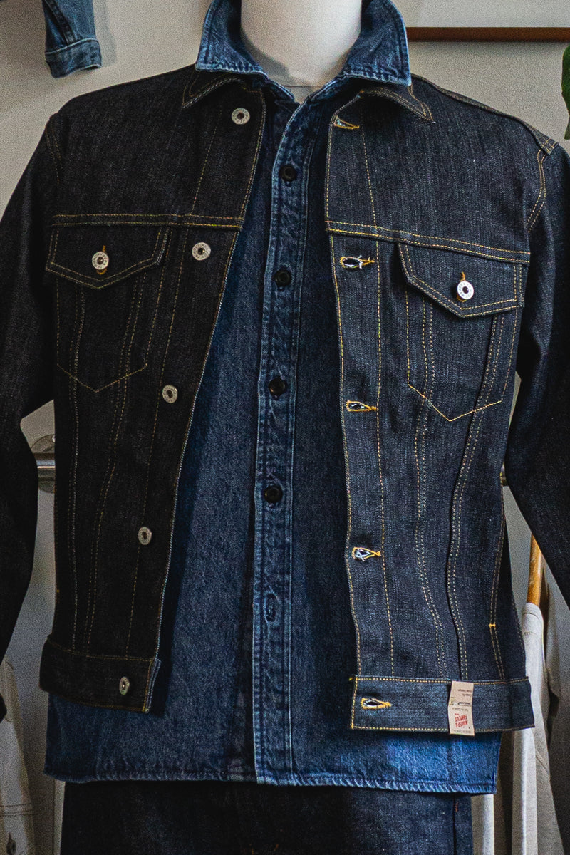 Denim jacket displayed on a mannequin against a neutral background